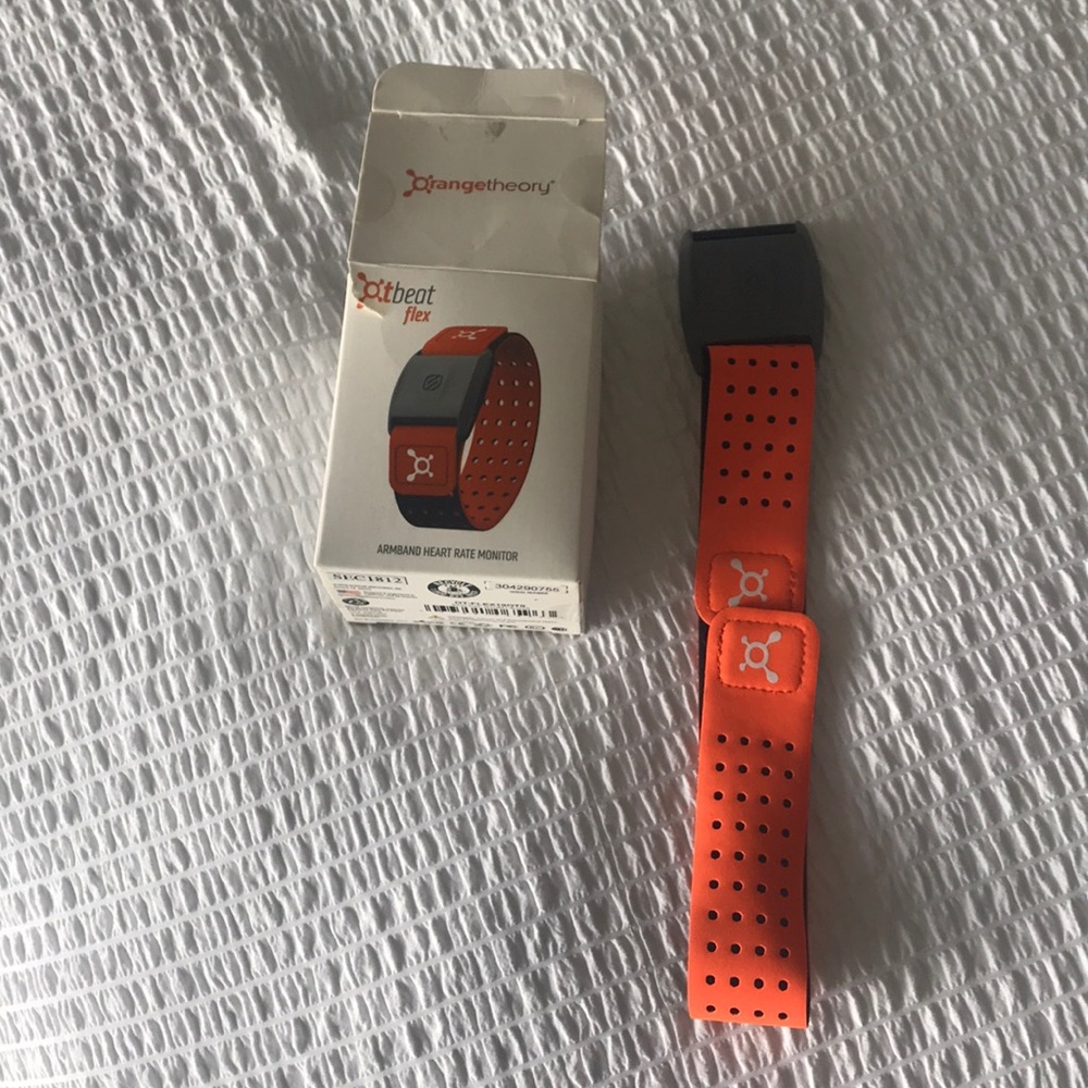 Orange Theory Heart Rate Monitor and Charger.